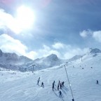 Ski school enjoying the slopes below